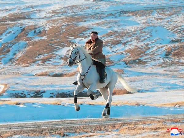 Kim Jong Un rides white horse to climb Mount Paektu in North Korea 