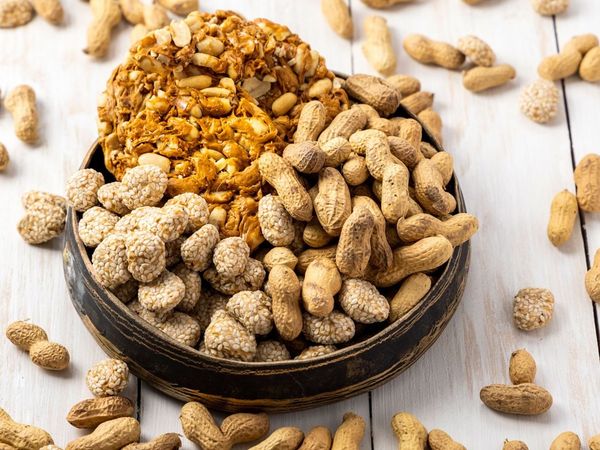 why Revadi and mungfali are put in Lohri in fire?