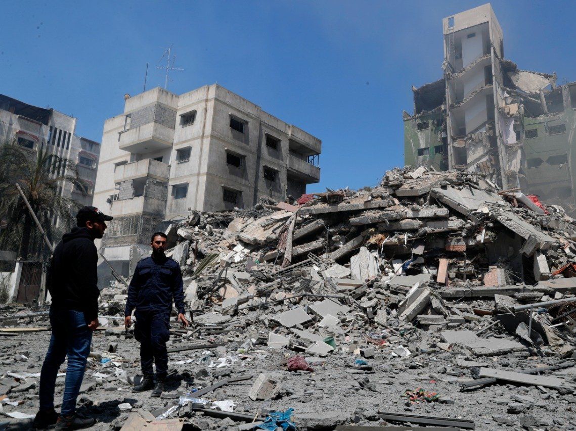 Israel Palestine violence: जमींदोज इमारतें बयां कर रहीं गाजा पट्टी की भयावह तस्वीर, See Pics