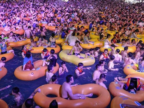 China partygoers cram into water park in Wuhan, where Covid first emerged