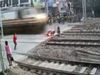 Accident Video Biker Has Close Shave With Train Watch Shocking Viral Video
