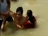 Ayodhya Husband thrashed for allegedly Kissing His Wife While Bathing In Sarayu River VIDEO Viral