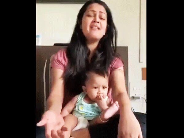 Mother was doing the song's Riyaaz the child sitting on her lap also started singing in a melodious voice see video