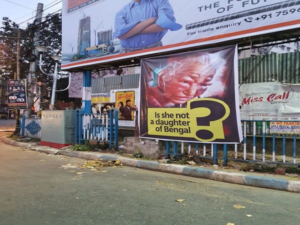 Posters on the streets of Kolkata, Says Is she not a daughter of Bengal?