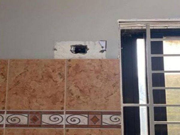 Hidden cameras installed behind a sheet with holes in girls and boys restrooms in Karachi, Pakistan