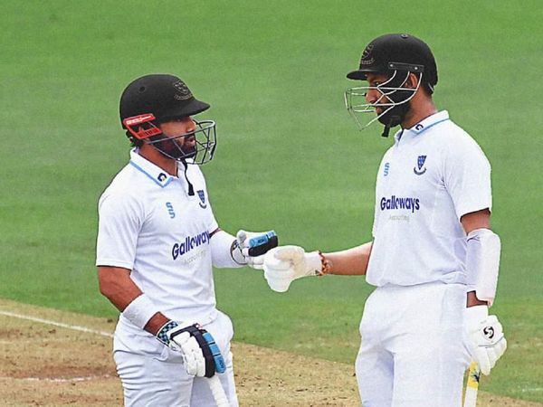 Cheteshwar-Pujara-Mohd-Rizwan