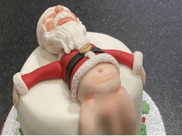 Christmas 2021 Mother bakes explicit drunk Santa cake In England