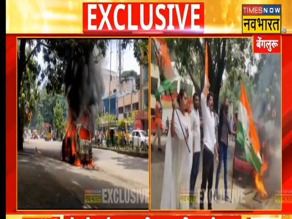 National Herald Case Violent protest by Youth Congress in Bengaluru car set on fire outside ED office