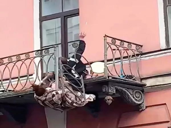 Couple Fall Off Balcony While Fighting, Watch Viral Video