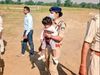 Viral photo DSP Monika Singh Carries her daughter on duty photo goes viral