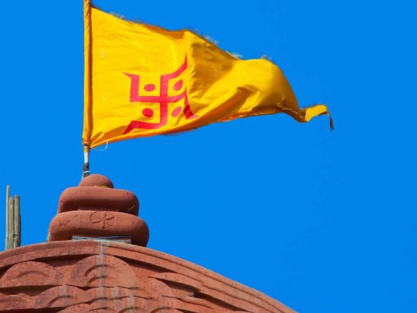 How to put Dhwaj on the roof of the house