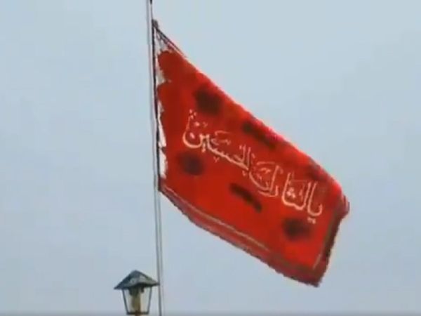 Iran hoists red flag on mosque