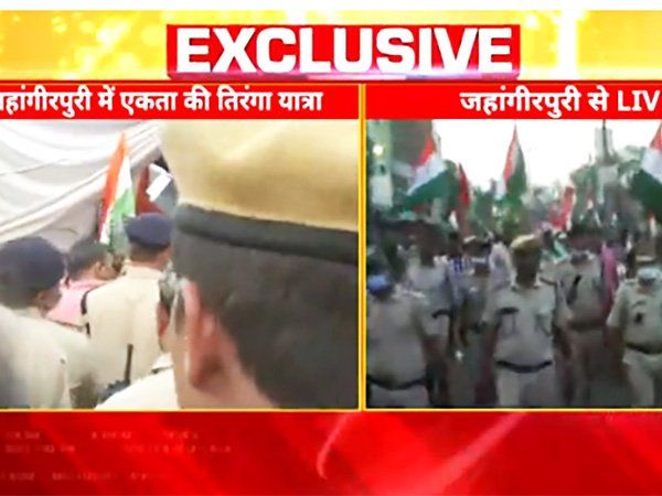 Jahangirpuri Violence: जहांगीरपुरी में हुई हिंसा के बाद कड़ी सुरक्षा में निकली 'तिरंगा यात्रा', दिया भाईचारे और अमन का पैगाम-VIDEO