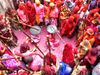 Lathmar Holi played in Mathura's Barsana lots of lathi sticks devotees immersed in bliss