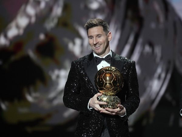 Lionel Messi wins2021 Ballon dOr trophy 
