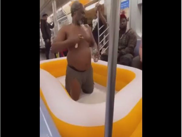 Man Taking Bath inside metro Shocking Video Goes Viral