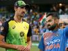 Mitchell Starc and Virat Kohli