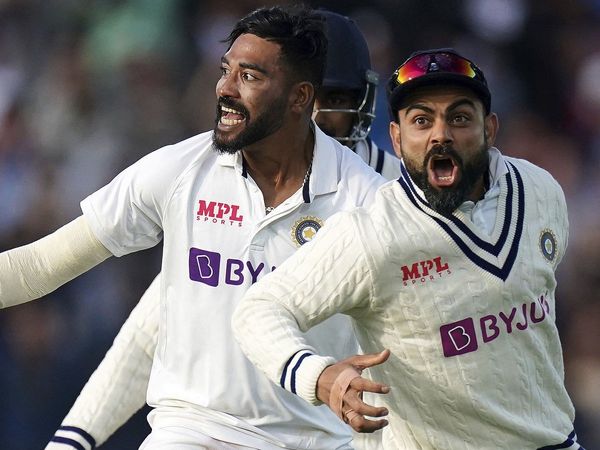 Mohammed Siraj and Virat Kohli