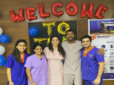 Natasha and Hardik with hospital staff Natasha and Hardik with hospital staff