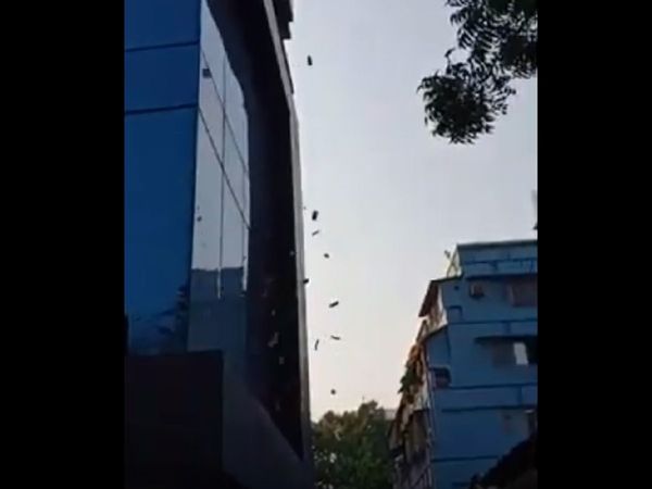 Suddenly Currency Notes Rain in Kolkata building