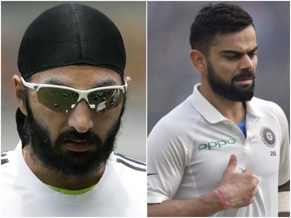 Monty Panesar and Virat Kohli