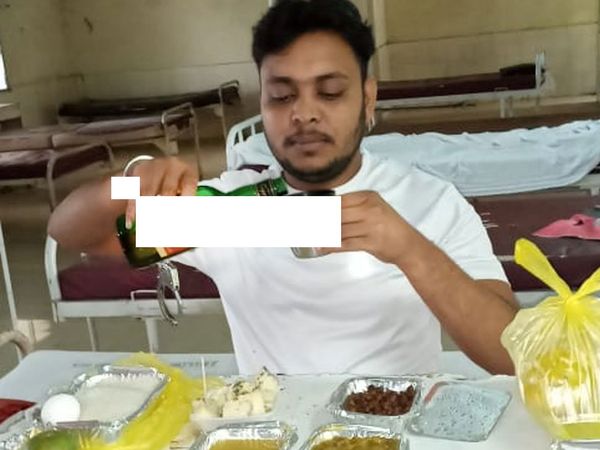 Jharkhand Dhanbad news a covid-19 prisoner was drinking liquor CM ordered inquiry on photo going viral