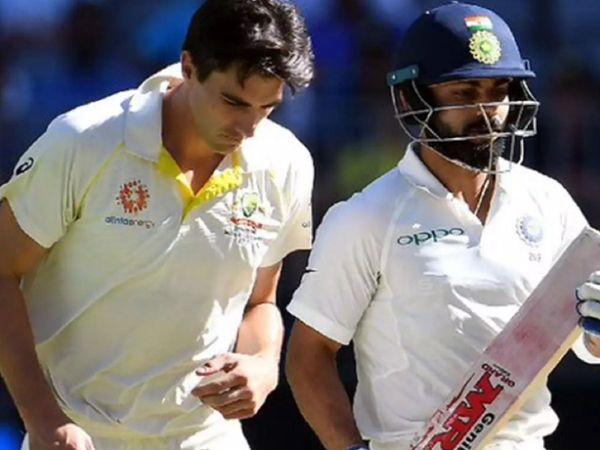 Pat Cummins with Virat Kohli