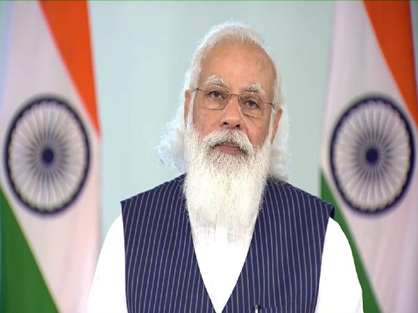 PM Modi interacts with beneficiaries of Pradhan Mantri Garib Kalyan Anna Yojana of Madhya Pradesh