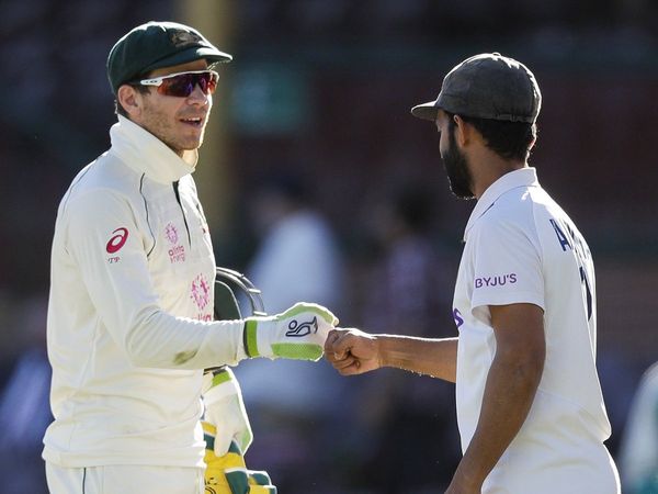 Tim Paine and Ajinkya Rahane 