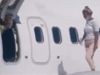 Woman in the plane upset due to heat, emergency gate opened, walk on wing Viral Video