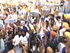 A group of people gathers at the entrance to the Golden Temple in Amritsar raises pro Khalistan slogans