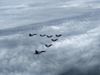 Rafale fighter aircraft flying with Sukhoi-30