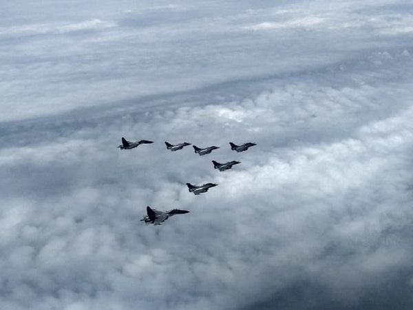 Rafale fighter aircraft flying with Sukhoi-30