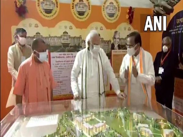 PM Narendra Modi and UP CM Yogi Adityanath in Aligarh