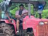 Salman Khan drives a tractor while farming