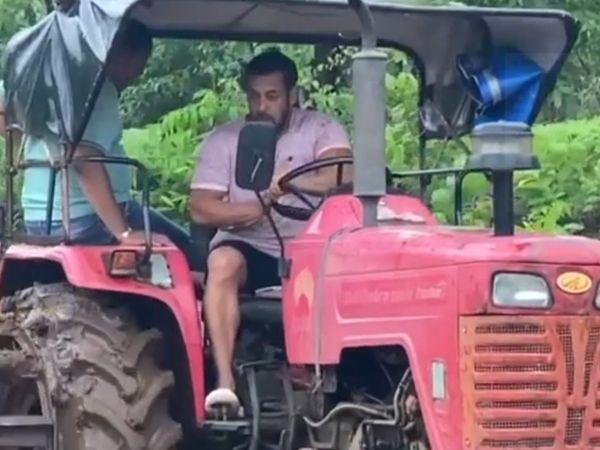 Salman Khan drives a tractor while farming