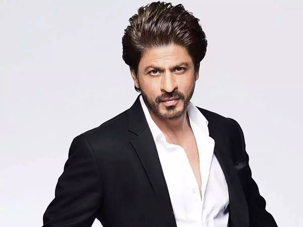 Shah Rukh Khan helps a child