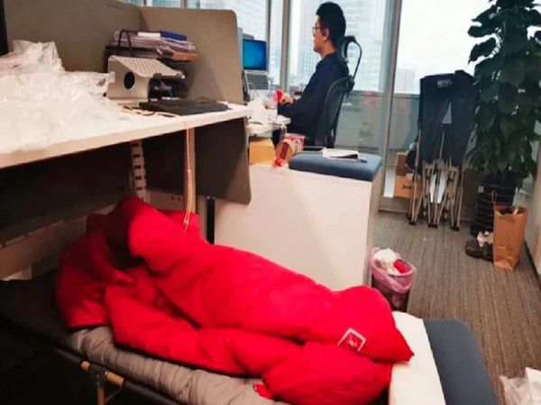 Many Employees, bankers and traders are sleeping in their offices in China's Shanghai amid a strict COVID-19 lockdown