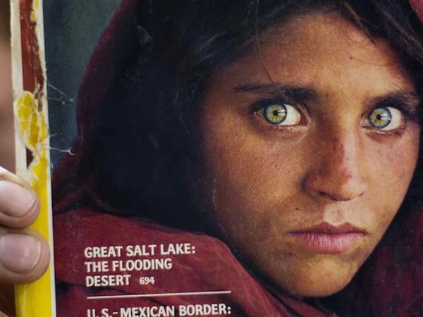 green-eyed Afghan girl Sharbat Gulla from famous cover portrait is evacuated to Italy