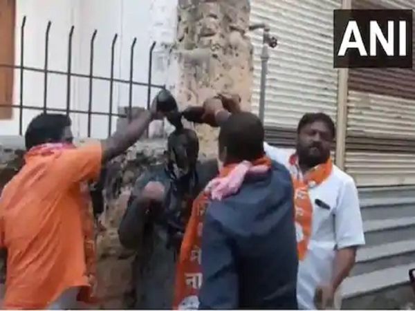 Maharashtra Shiv Sena workers pour black ink on a BJP leader and forced him to wear a saree
