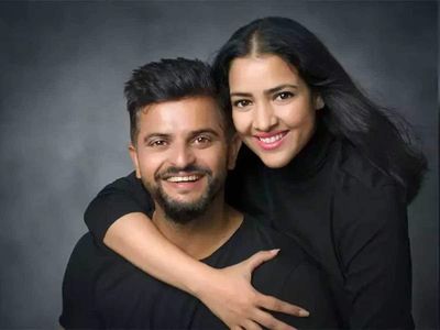 Suresh Raina with his wife Suresh Raina with his wife