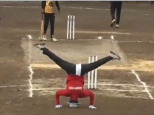 Umpire signals wide ball with upside down leg split Video Goes viral