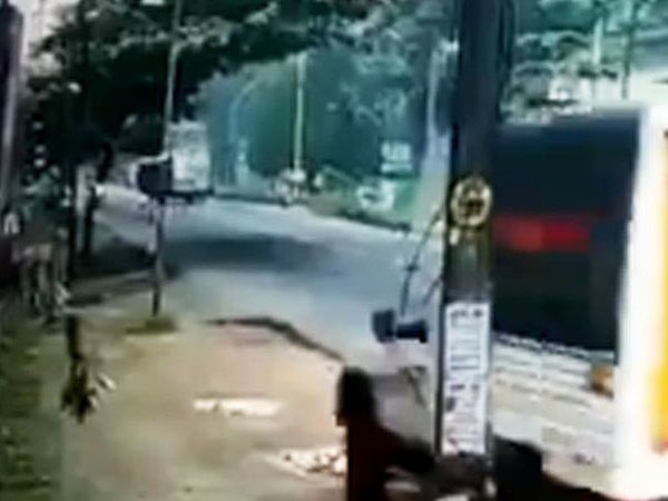  A person is save after a speeding truck passed in near an inch away in kerala watch video 