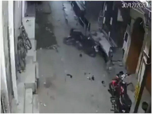 A parked bike was seen moving on its own in a CCTV video 