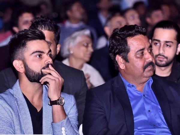 Virat Kohli with Rajkumar Sharma