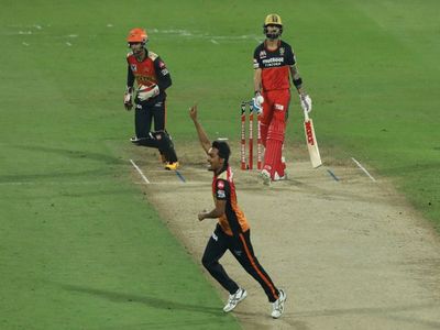 Virat Kohli and Sandeep Sharma Virat Kohli and Sandeep Sharma