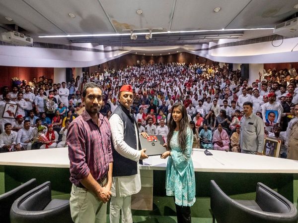 Samajwadi Party, Yogi Adityanath government, laptop distribution scheme, Azamgarh by-election, Rampur by-election