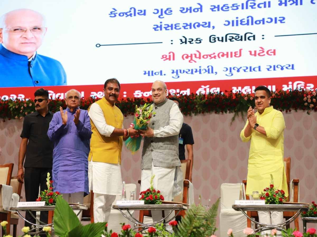 Amit Shah: केंद्रीय गृह मंत्री अमित शाह ने कहा- कांग्रेस ने सिर्फ बात की, मोदी ने बदली गरीबों की जिंदगी