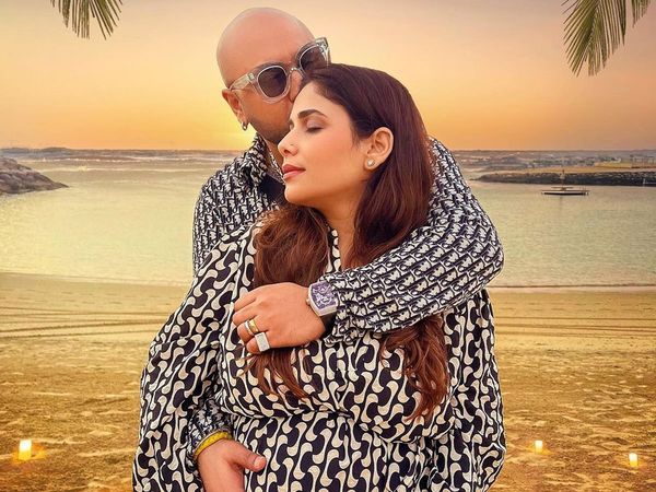 B. Praak With Wife Meera Bachan