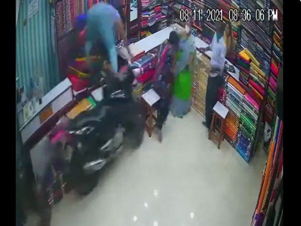 Bike Viral video motorcycle crashes into clothing store in Telangana Viral Video